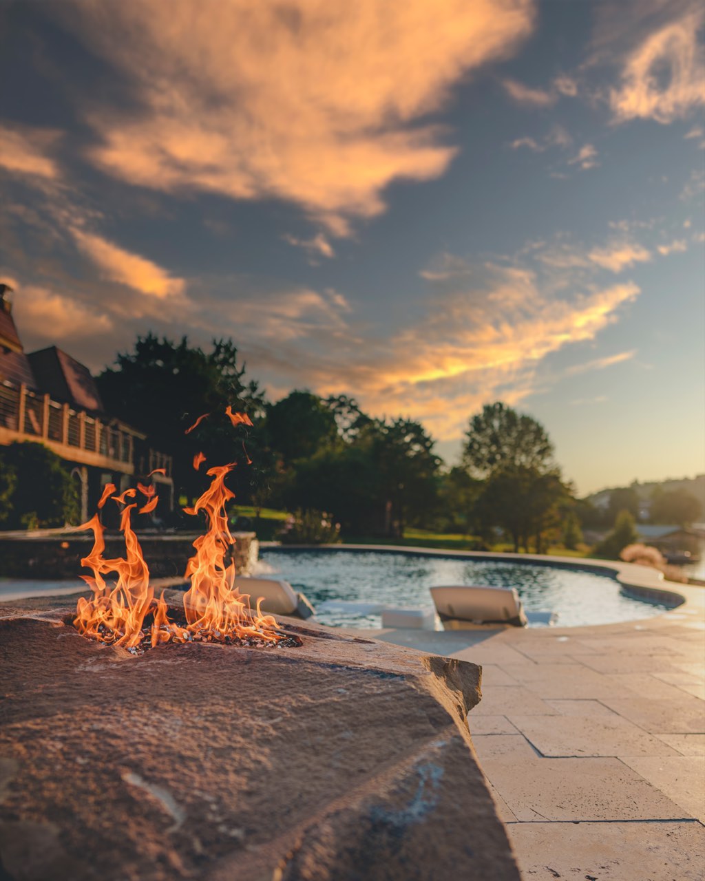Twilight Fire Feature Beside Freeform Pool