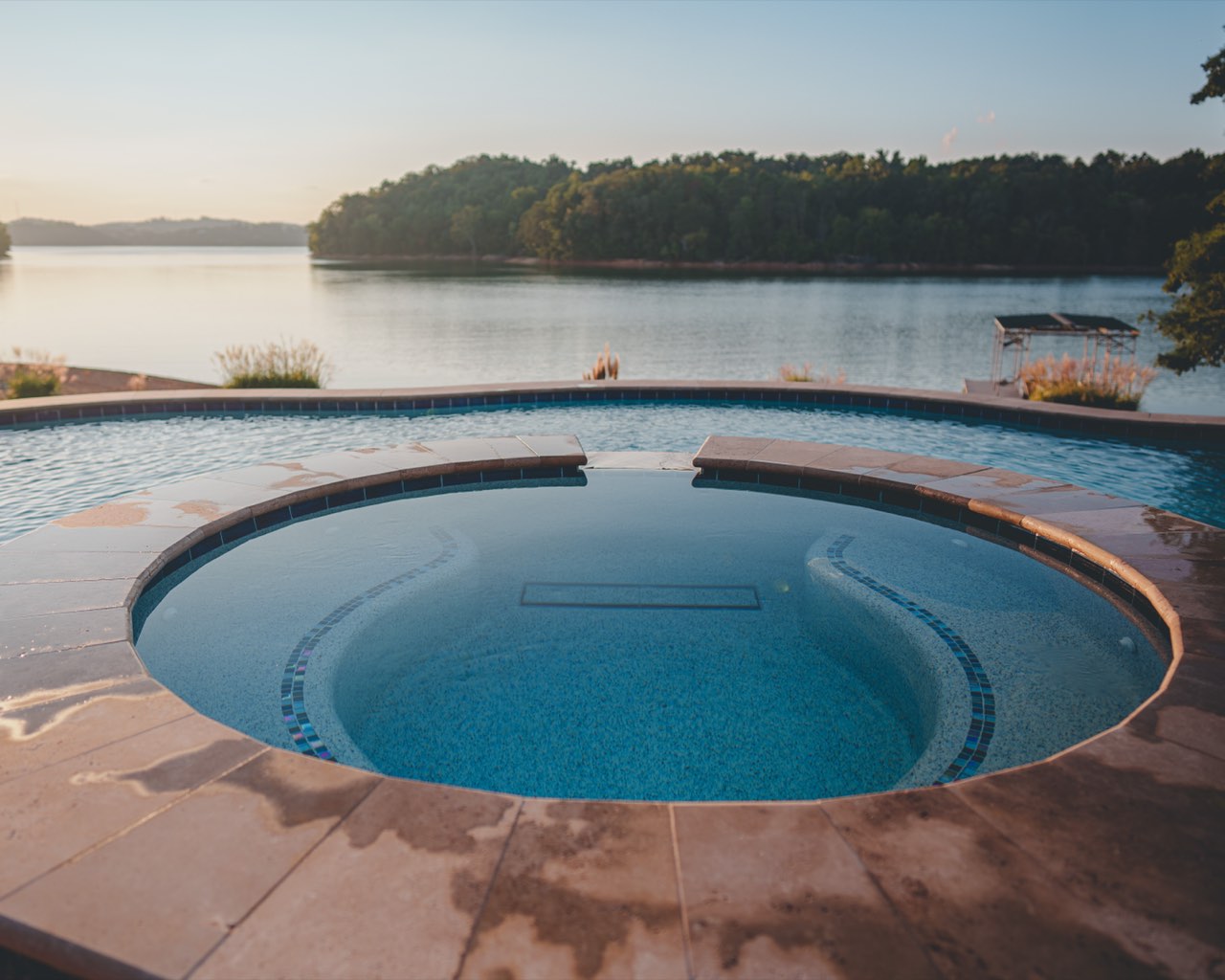 Round Spa & Spillover Pool Facing the Lake