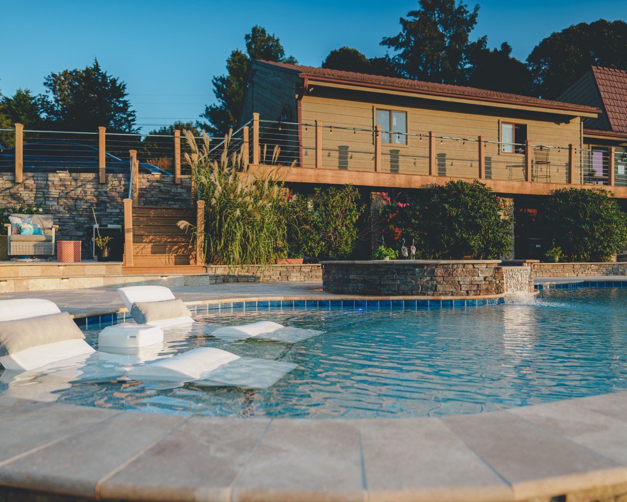Tanning Ledge Loungers & Stacked Stone Water Wall
