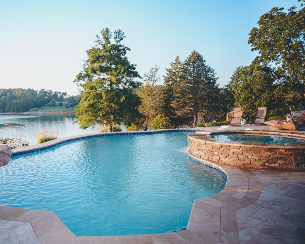 Freeform Pool & Raised Stacked Stone Spa