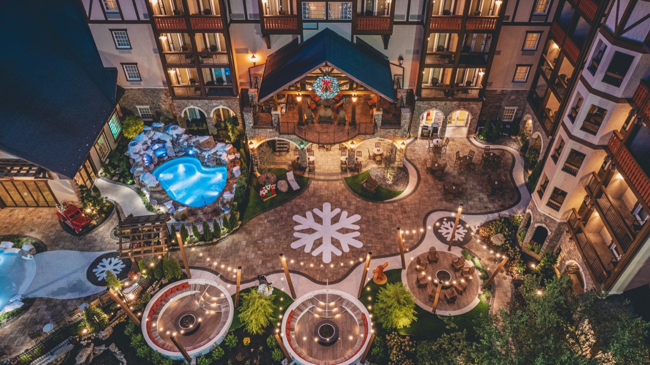 Twilight Aerial Of Paver Courtyard And Fire Pit Seating