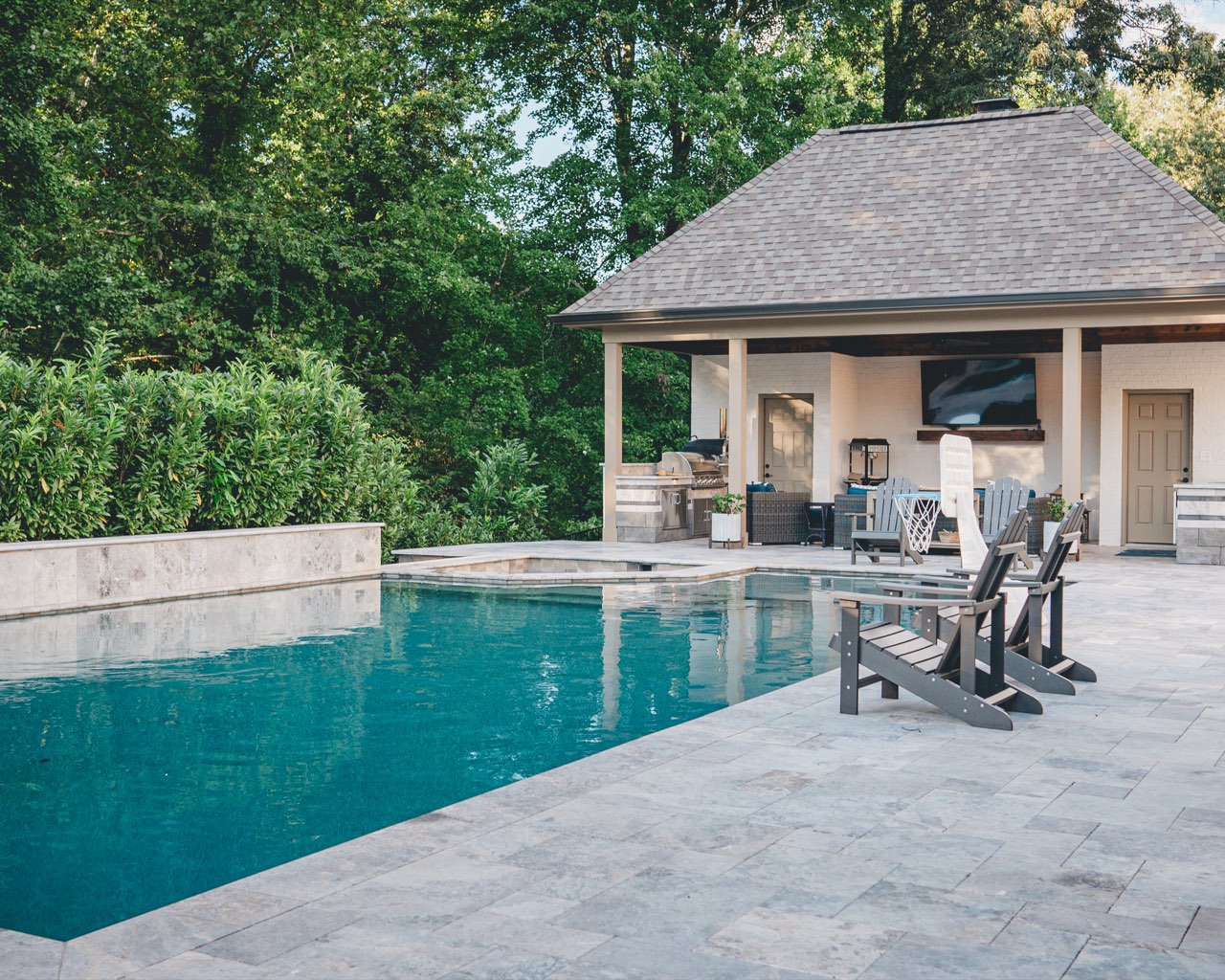 Pool, Travertine Deck & Pavilion With Lush Privacy Hedge