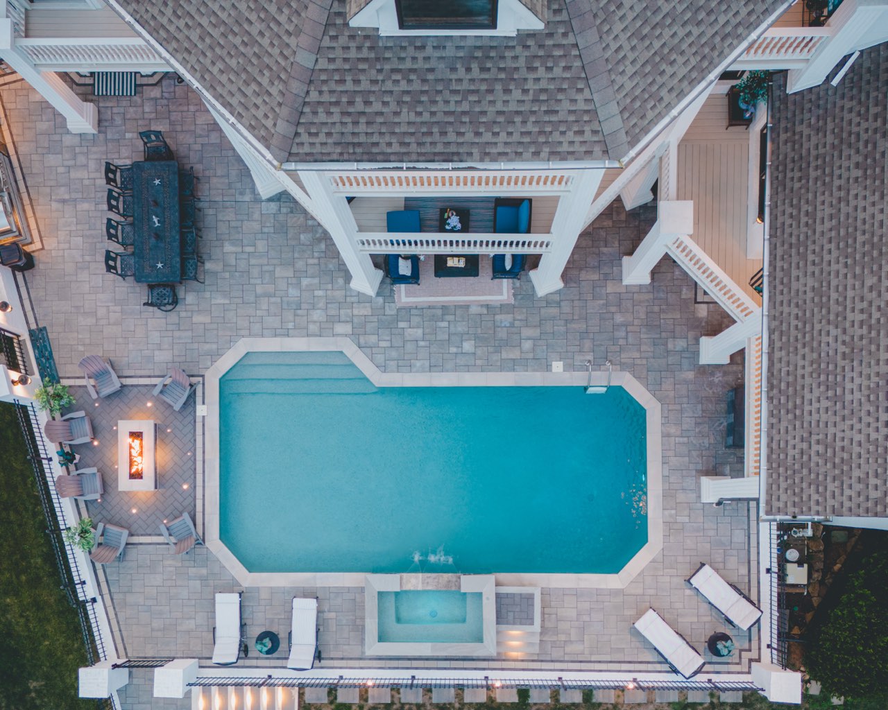 Overhead Aerial Gunite Pool, Spa & Paver Patio at Dusk