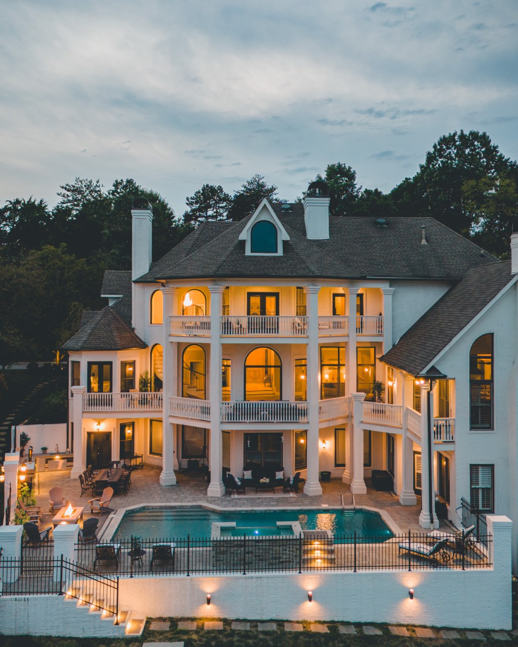 Aerial Estate Rear Elevation, Pool & Spa Glowing at Dusk