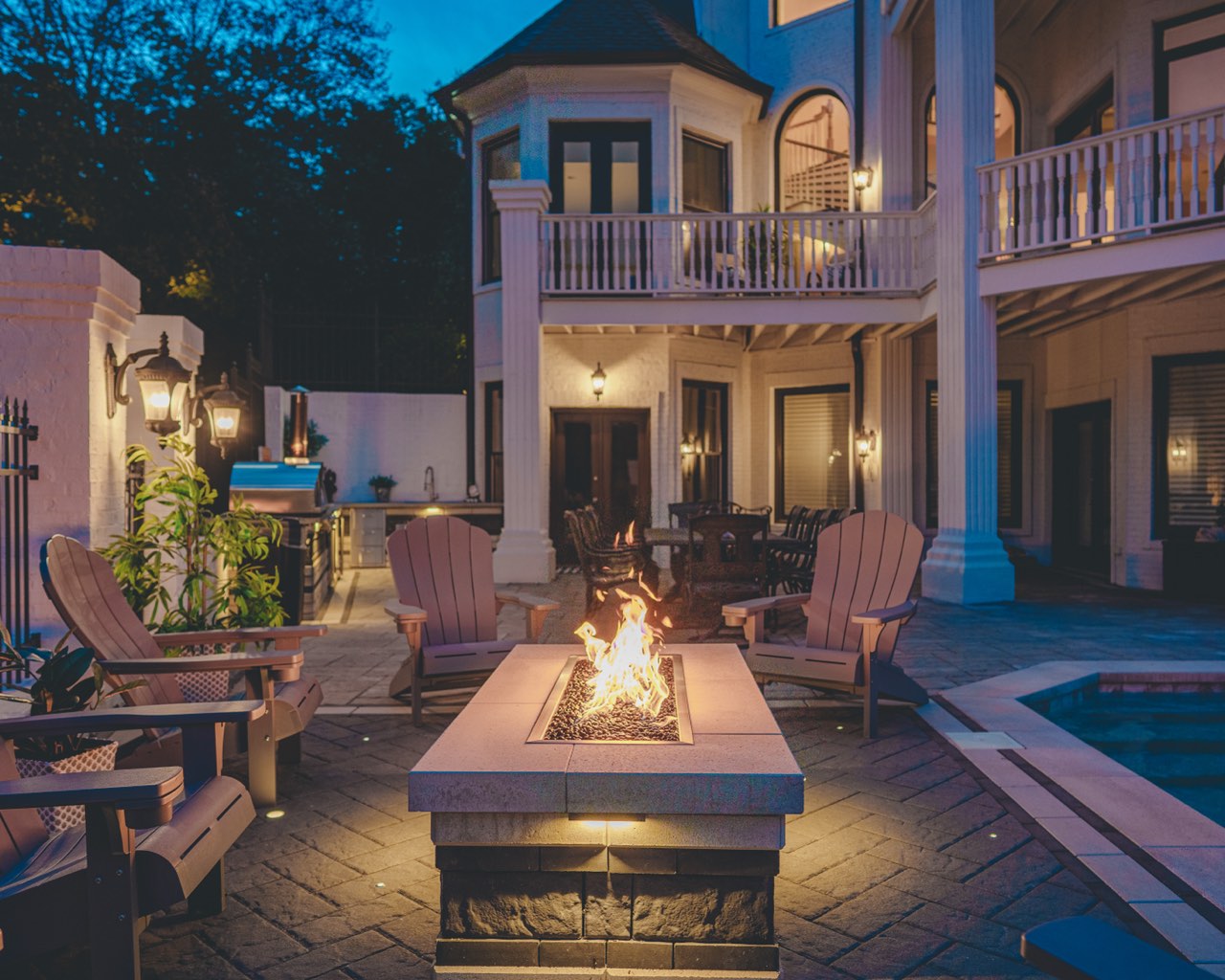 Linear Gas Fire Pit & Adirondack Lounge Below Balconies