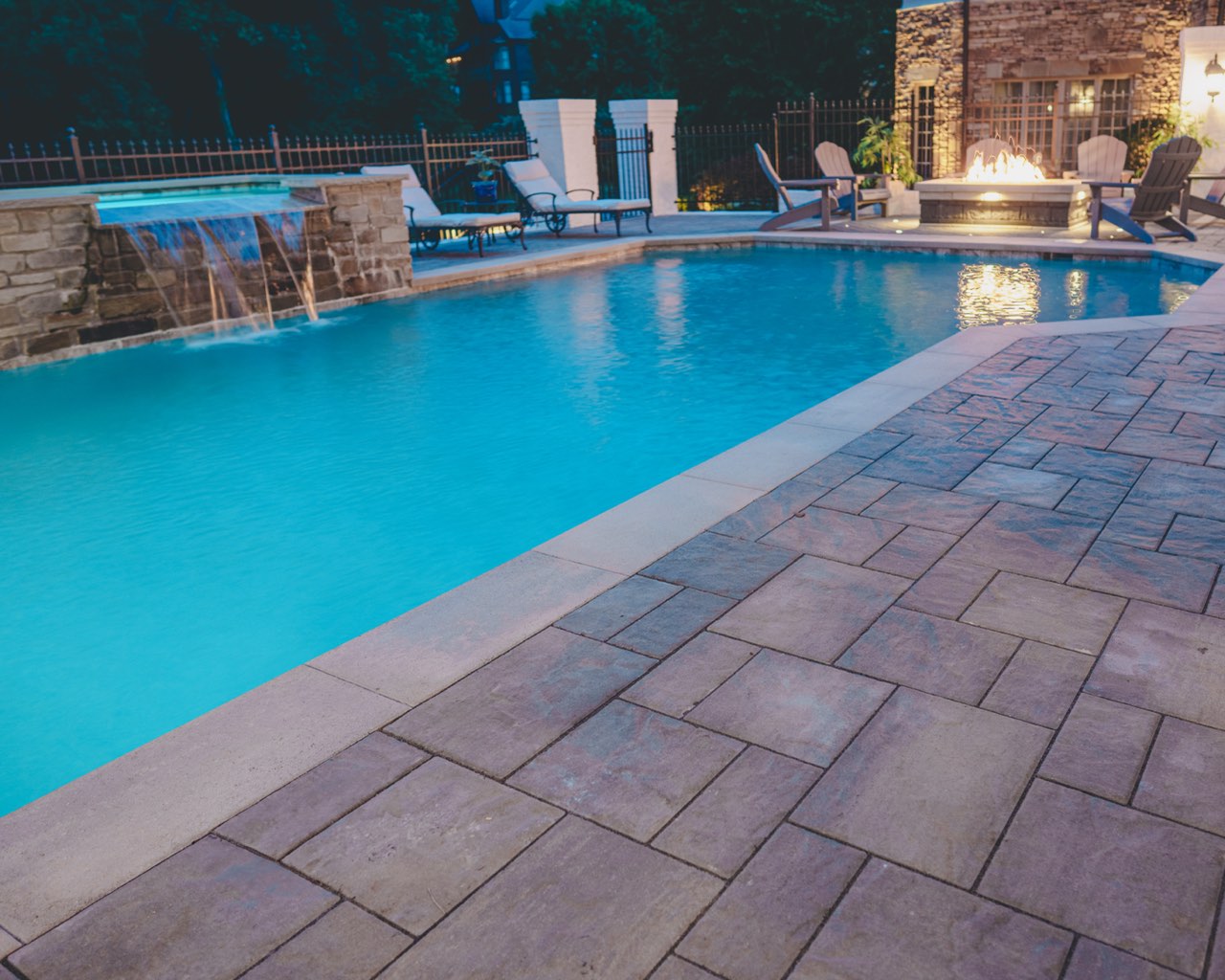Stone Spa Steps & Paver Deck Detail With Accent Lighting