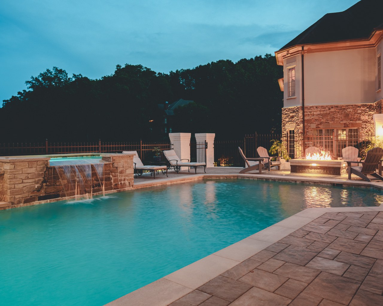 Spa Spillway, Fire Feature & Paver Deck at Twilight