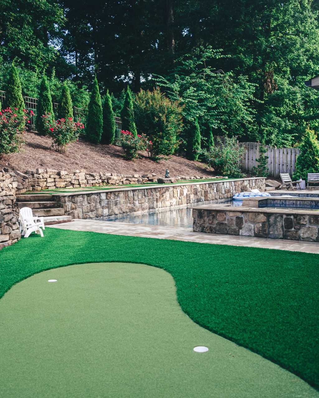 Putting Green, Pool & Stacked Stone Retaining Wall