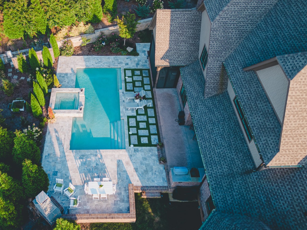 Aerial Pool, Spa & Turf-Inlay Deck Beside the Home