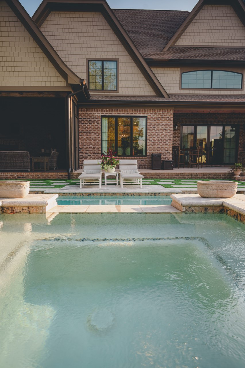 Raised Spa With Sheer Spillover & Turf-Inlay Deck