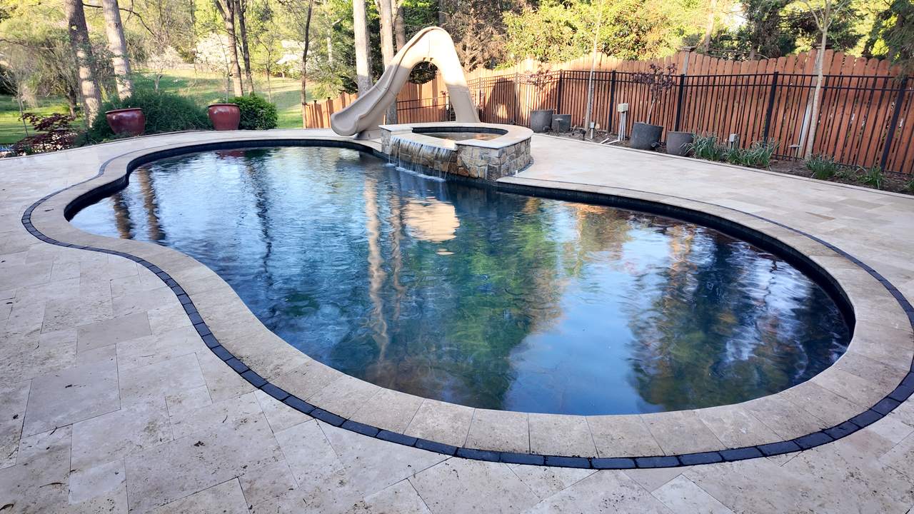 Golden Hour Retreat, Pool Renovation & Travertine Deck in Knoxville, TN - photo 1