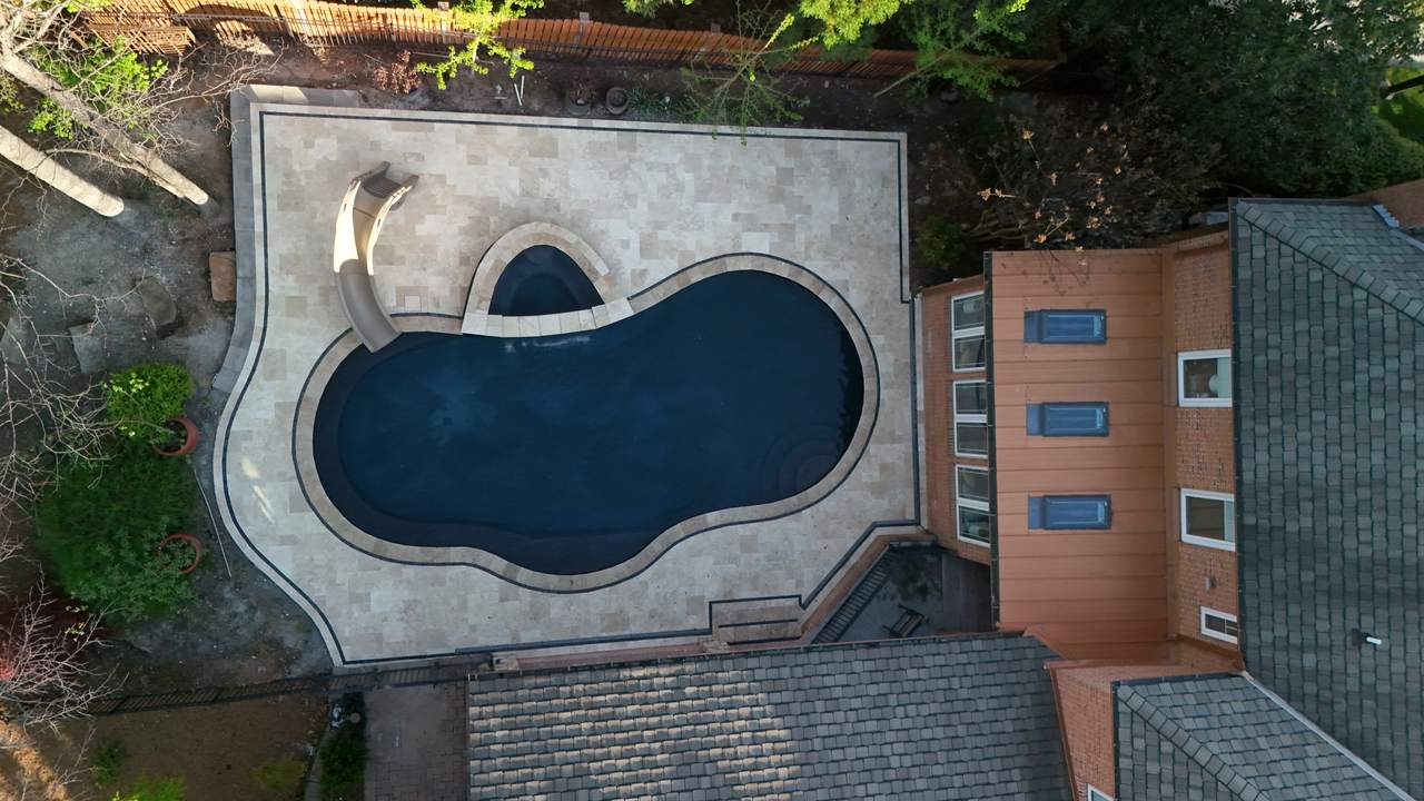 Golden Hour Retreat, Pool Renovation & Travertine Deck in Knoxville, TN - photo 2