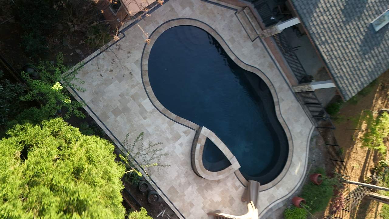 Golden Hour Retreat, Pool Renovation & Travertine Deck in Knoxville, TN - photo 3